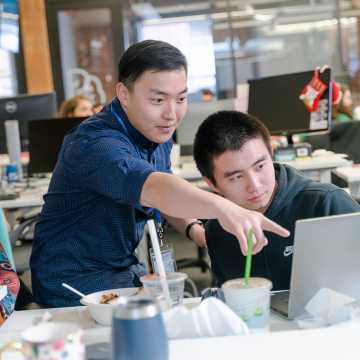 a mentor teaching a hacker